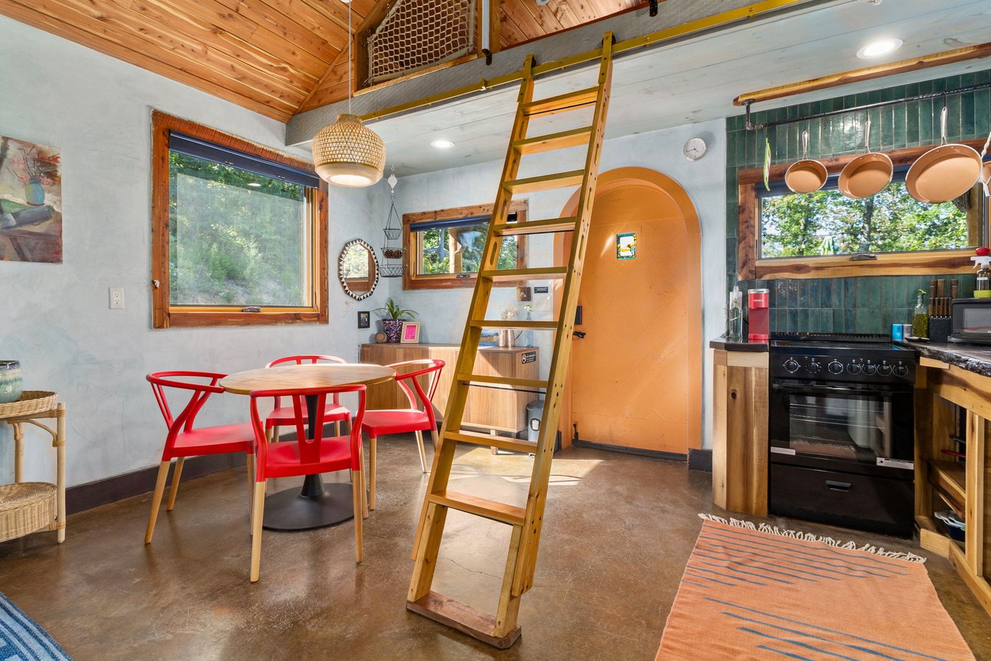 Whippoorwill dining nook and ladder up to the loft