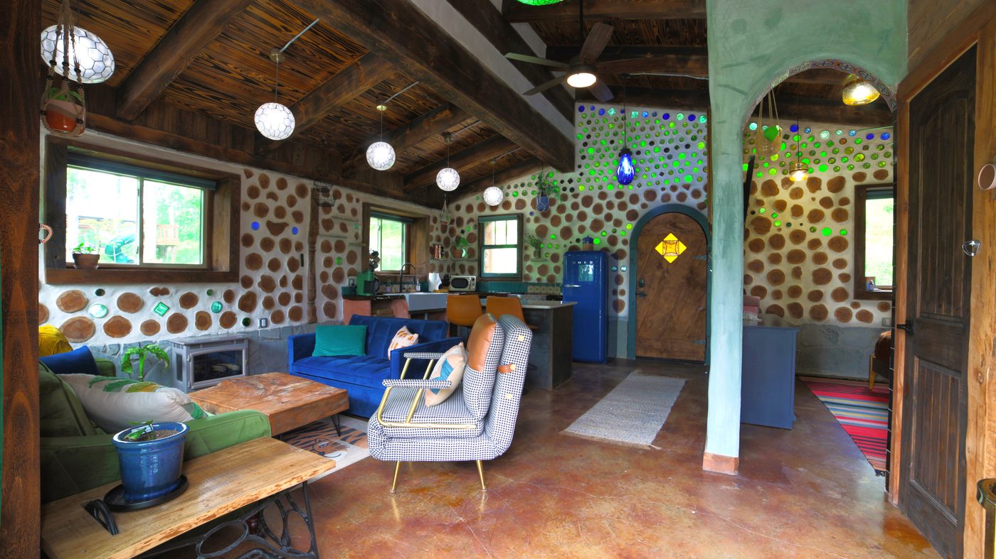 Inside Goldfinch, with its cordwood and bottle-glass walls