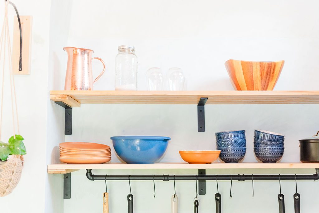 Blackbird open shelves with colorful pottery