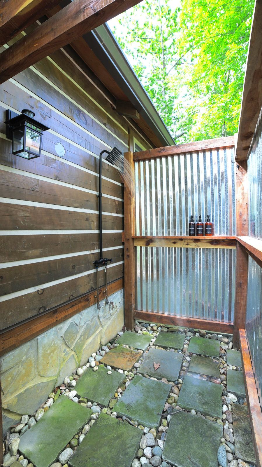 Chickadee outdoor shower open to the trees
