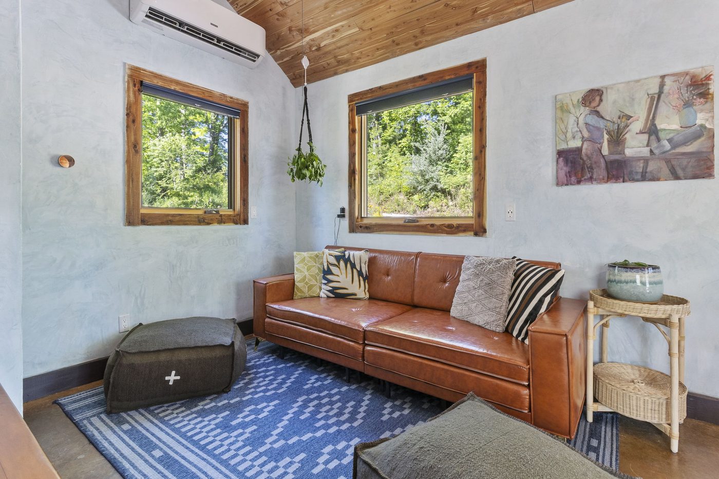 Whippoorwill living room with leather couch