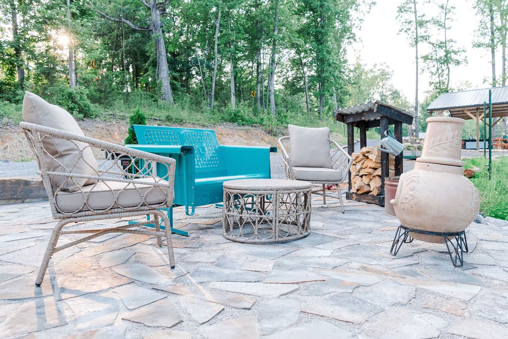 Whippoorwill stone patio with firepit and outdoor seating